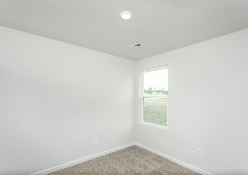 Windows let in lots of light to the bedrooms