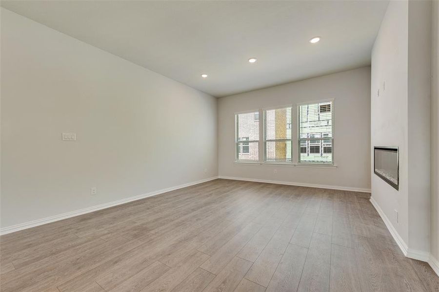 Empty room featuring light hardwood / wood-style flooring