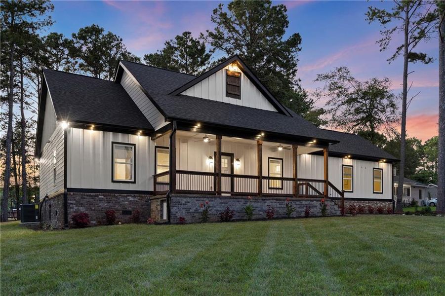 Front exterior of a new home in , Monroe, GA, highlighting curb appeal (Image 2). Front exterior of a new home in , Monroe, GA, highlighting curb appeal (Image 2).