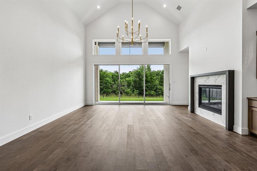 Our Justin floor plan offers a spacious family room with a beautiful view! Our Justin floor plan offers a spacious family room with a beautiful view!