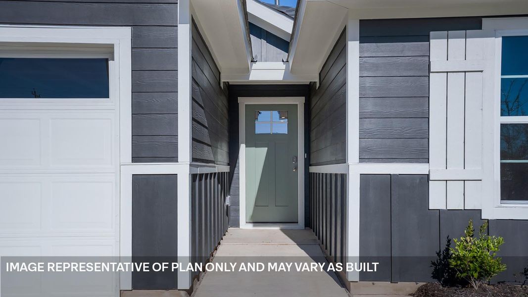 Exterior details and patio area of a home in Marigold, Kyle (Image 15).