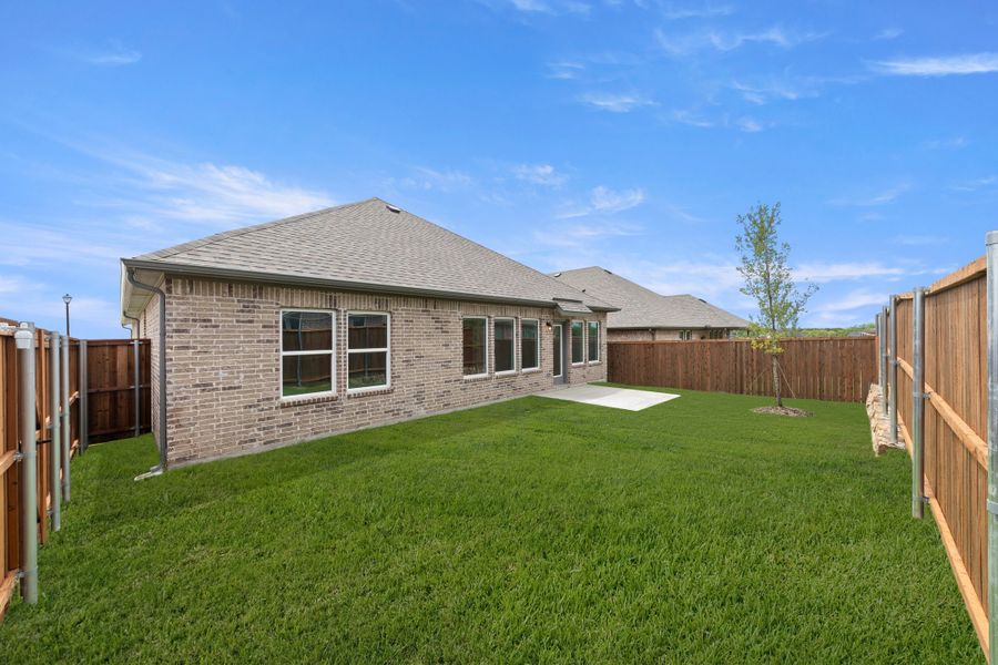 Exterior details and patio area of a home in Creekside, Royse City (Image 3).