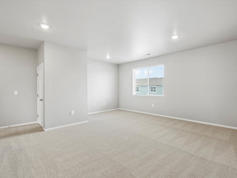 Spacious, unfurnished interior of a new home in Poudre Heights: The Alpine Collection, Windsor (Image 13).