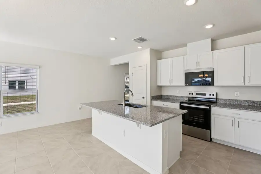 Furnished interior view inside a new home in Reserve at Forest Lake Townhomes, Lake Wales (Image 6). Furnished interior view inside a new home in Reserve at Forest Lake Townhomes, Lake Wales (Image 6).