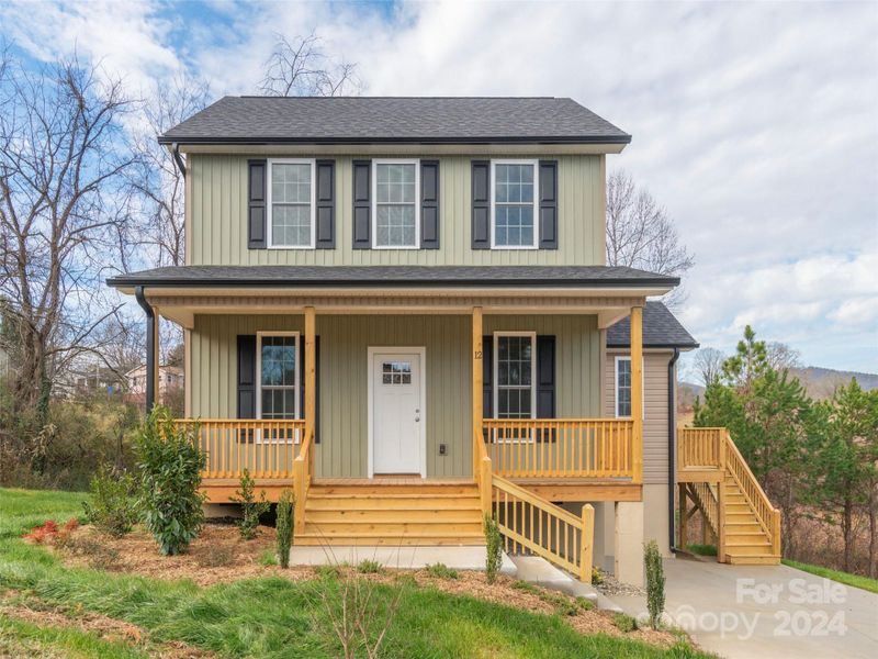 Front exterior of a new home in , Asheville, NC, highlighting curb appeal (Image 18).