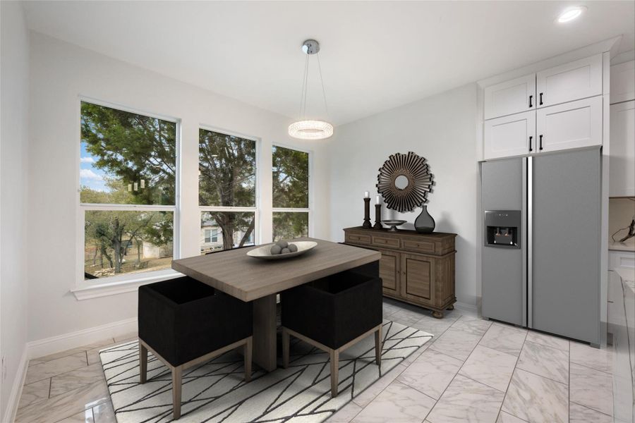 Dining area with light marble finish floors