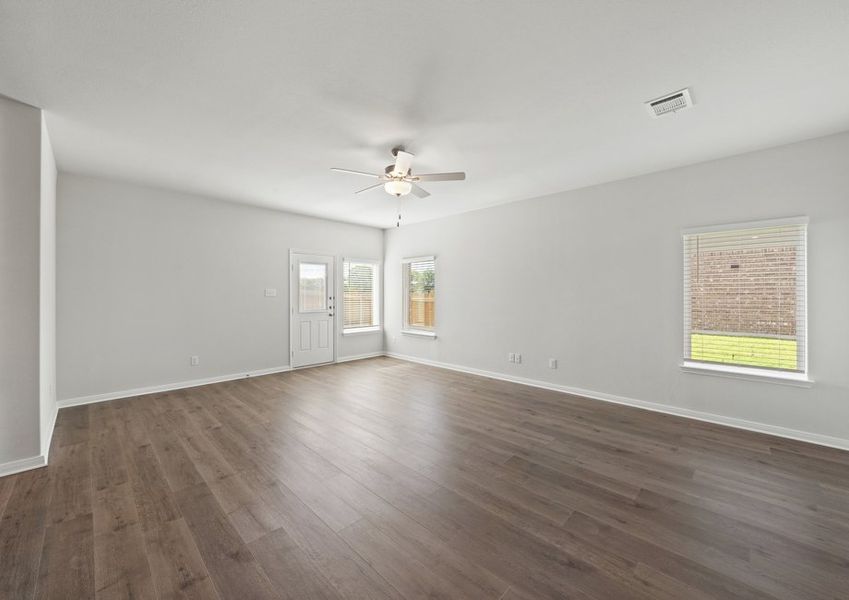 The living room has windows that let in great, natural light. The living room has windows that let in great, natural light.