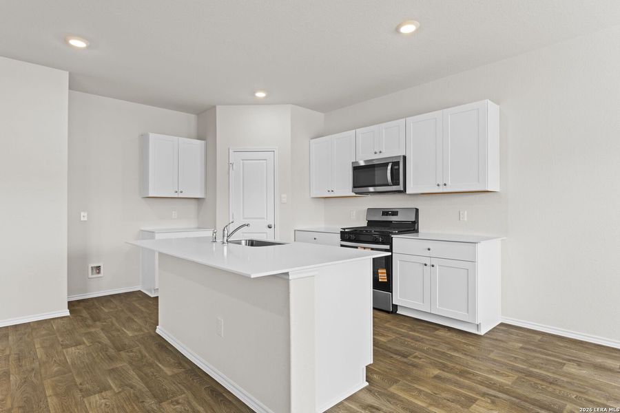 Furnished interior view inside a new home in Hunters Ranch, San Antonio (Image 4).