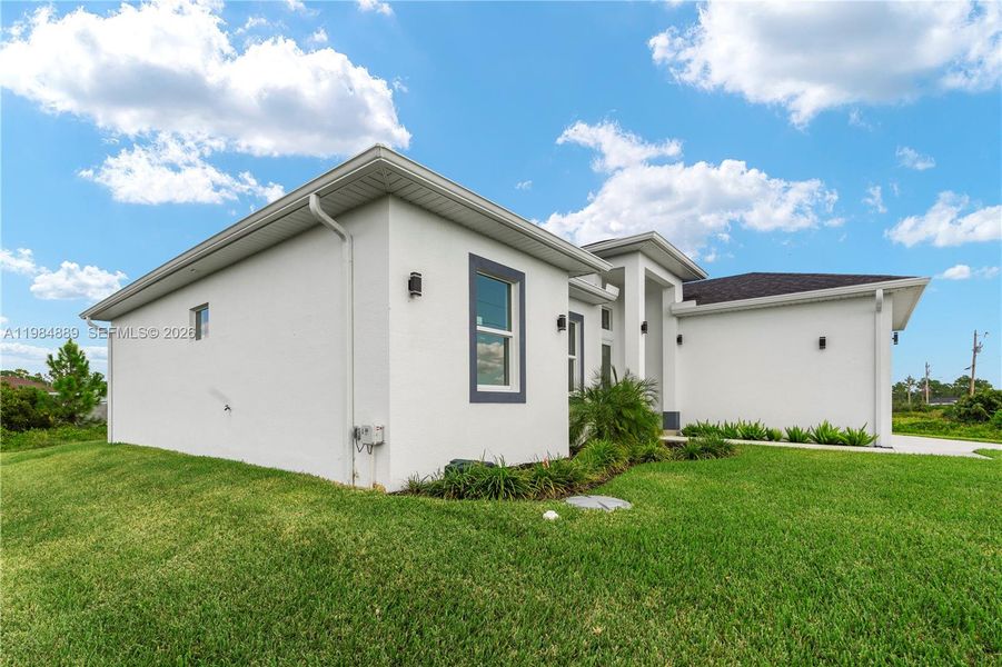 Exterior details and patio area of a home in , Lehigh Acres (Image 34).