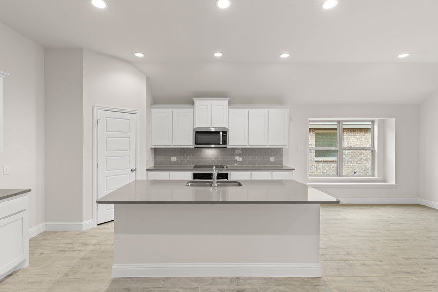 Representative exterior photo of a completed home built from the Kingston by Impression Homes in Timberbrook, Justin, TX (Image 6).