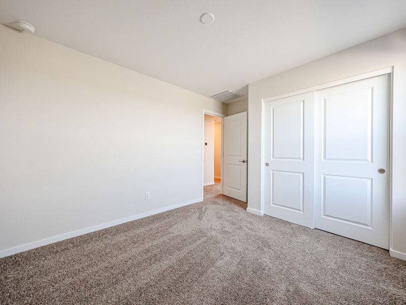 A room with white doors.