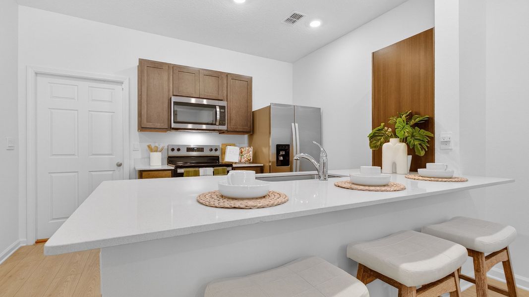 Representative furnished interior of a home built from the Bradford by D.R. Horton in Liberty Cove, Yulee (Image 8).