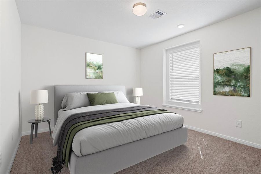 This secondary bedroom features high ceilings, custom paint, plush carpet, and a large window with privacy blinds!