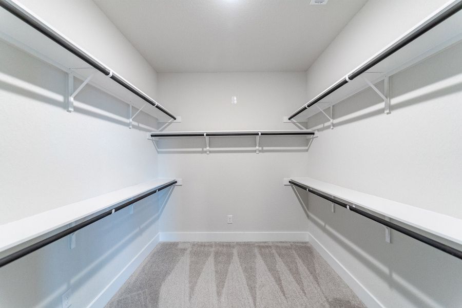 Spacious, unfurnished interior of a new home in The Woodlands at Medina Hills, Mico (Image 19).