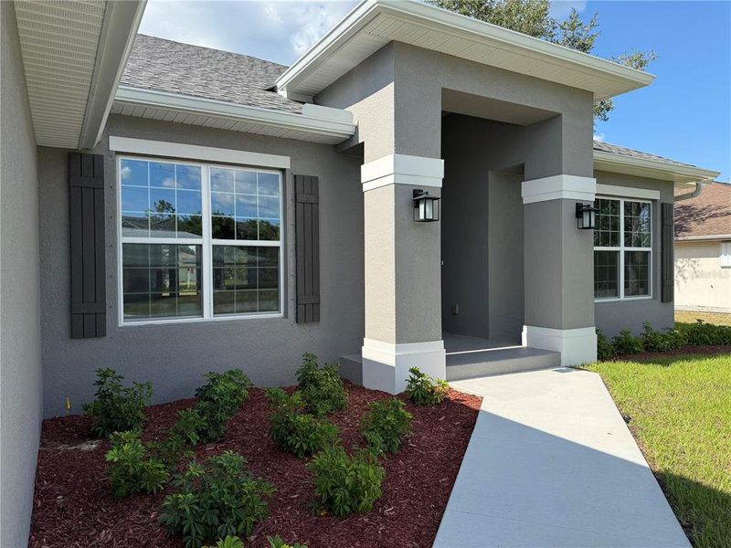 Exterior details and patio area of a home in Deep Creek, Punta Gorda (Image 12).