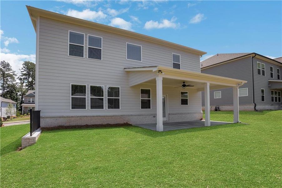 Exterior details and patio area of a home in Bailey Fence, Dacula (Image 22).