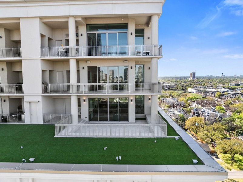 Stunning aerial view focusing on the 15th floor penthouse outdoors Stunning aerial view focusing on the 15th floor penthouse outdoors