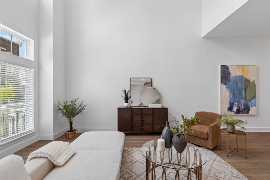 Representative furnished interior of a home built from the Roosevelt by Centre Living Homes in Newman Village Townhomes, Frisco (Image 9).
