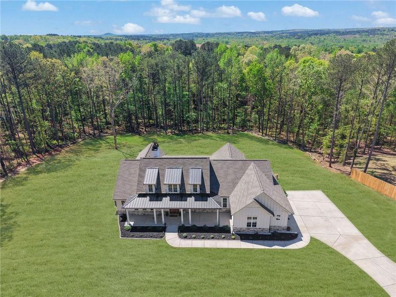 Front exterior of a new home in , Monroe, GA, highlighting curb appeal (Image 29).