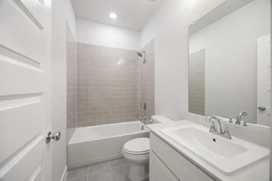Bathroom in the Wimbledon home plan by Trophy Signature Homes – REPRESENTATIVE PHOTO Bathroom in the Wimbledon home plan by Trophy Signature Homes – REPRESENTATIVE PHOTO