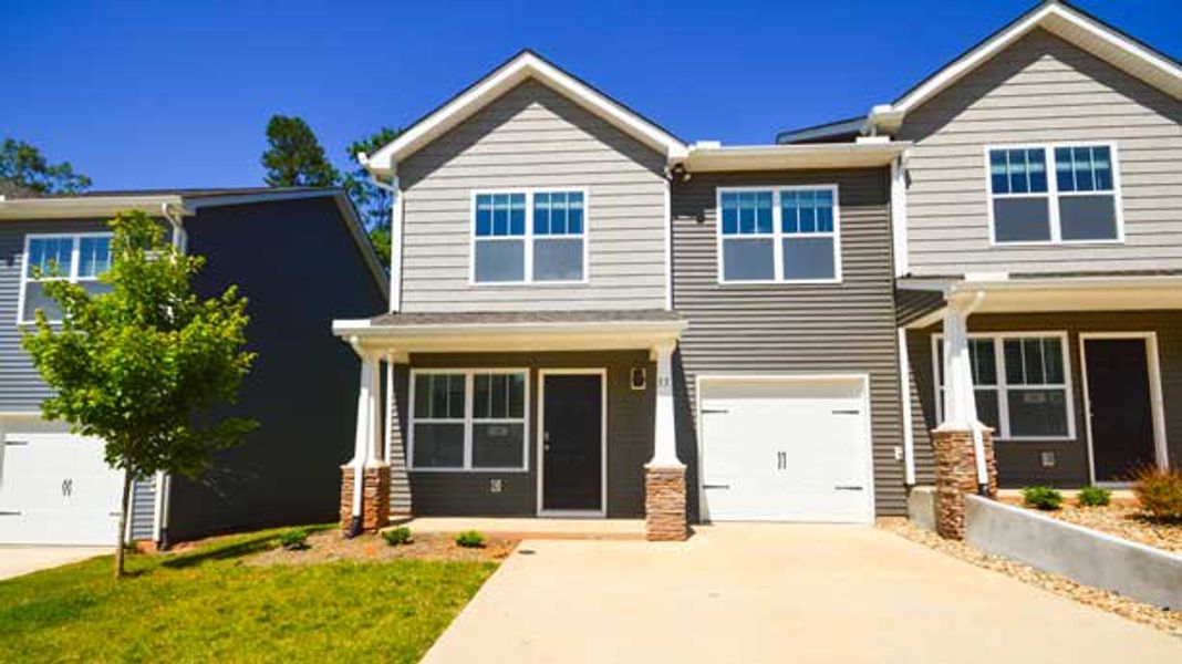Front exterior of a new home in Aberdeen Place, Asheville, NC, highlighting curb appeal (Image 1).