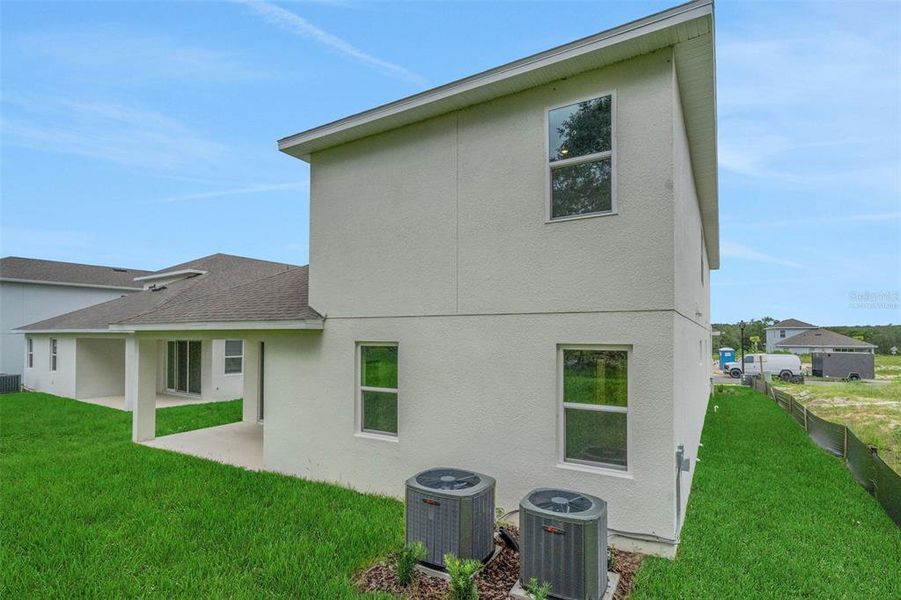 Exterior details and patio area of a home in Crossroads at Kelly Park, Apopka (Image 21). Exterior details and patio area of a home in Crossroads at Kelly Park, Apopka (Image 21).