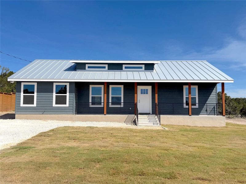 Front exterior of a new home in , Spring Branch, TX, highlighting curb appeal (Image 23).