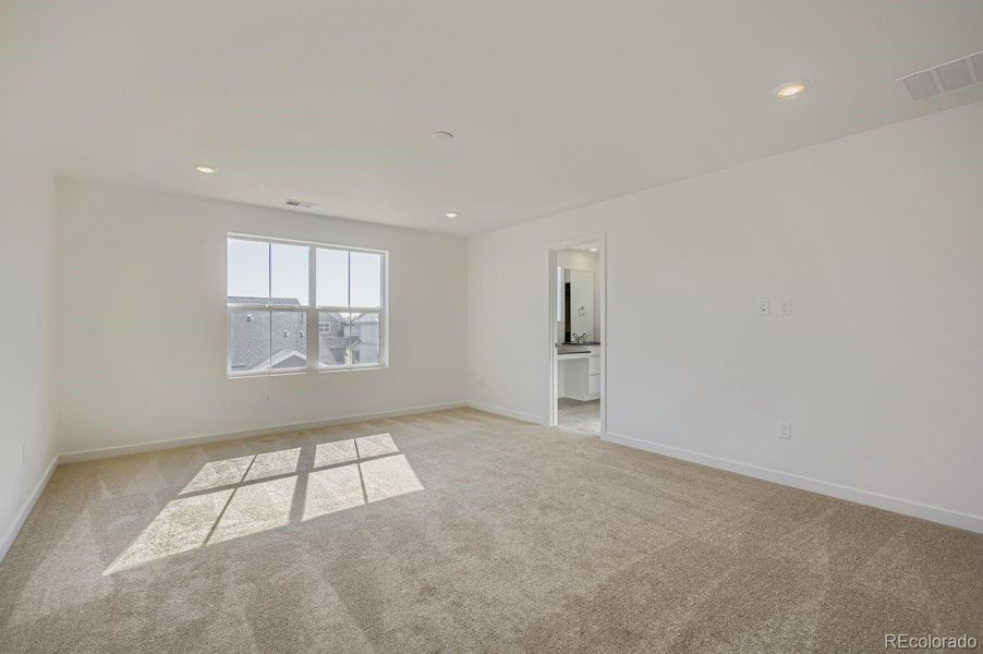 Spacious, unfurnished interior of a new home in Riano Ridge: The Pioneer Collection, Loveland (Image 10).