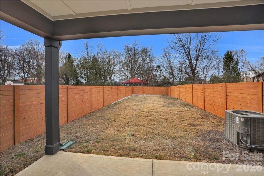 Exterior details and patio area of a home in , Charlotte (Image 26). Exterior details and patio area of a home in , Charlotte (Image 26).