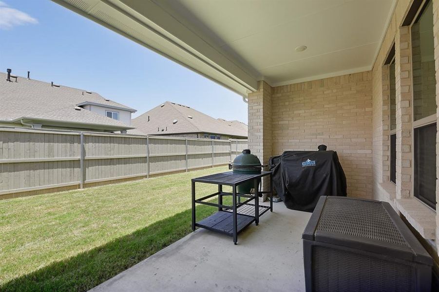 Exterior details and patio area of a home in Pecan Square, Northlake (Image 3).