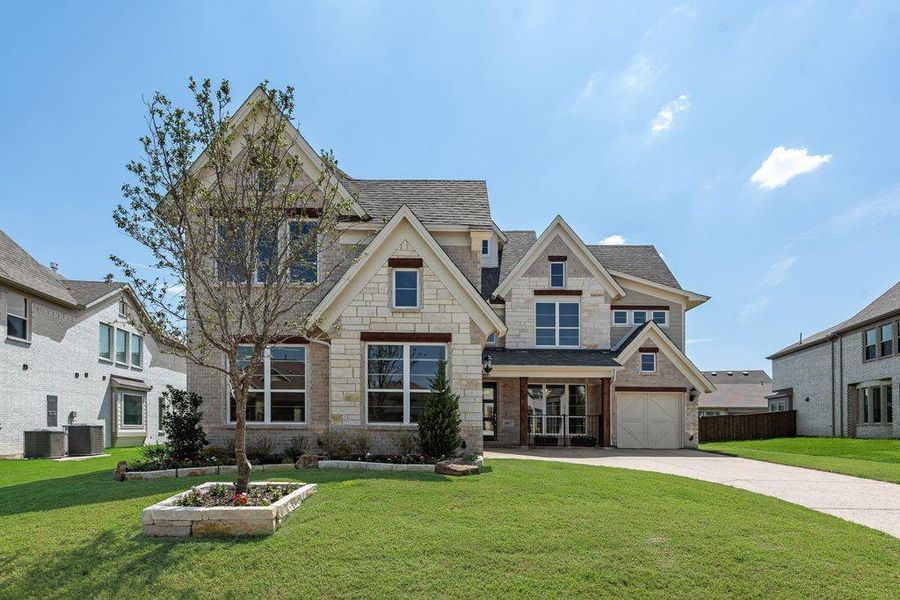 Front exterior of a new home in South Pointe, Mansfield, TX, highlighting curb appeal (Image 18).