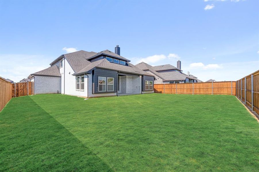 Exterior details and patio area of a home in Mockingbird Hills 60-65, Joshua (Image 18).