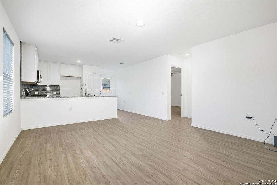 Spacious, unfurnished interior of a new home in Vida: Cottage Collection, San Antonio (Image 10). Spacious, unfurnished interior of a new home in Vida: Cottage Collection, San Antonio (Image 10).