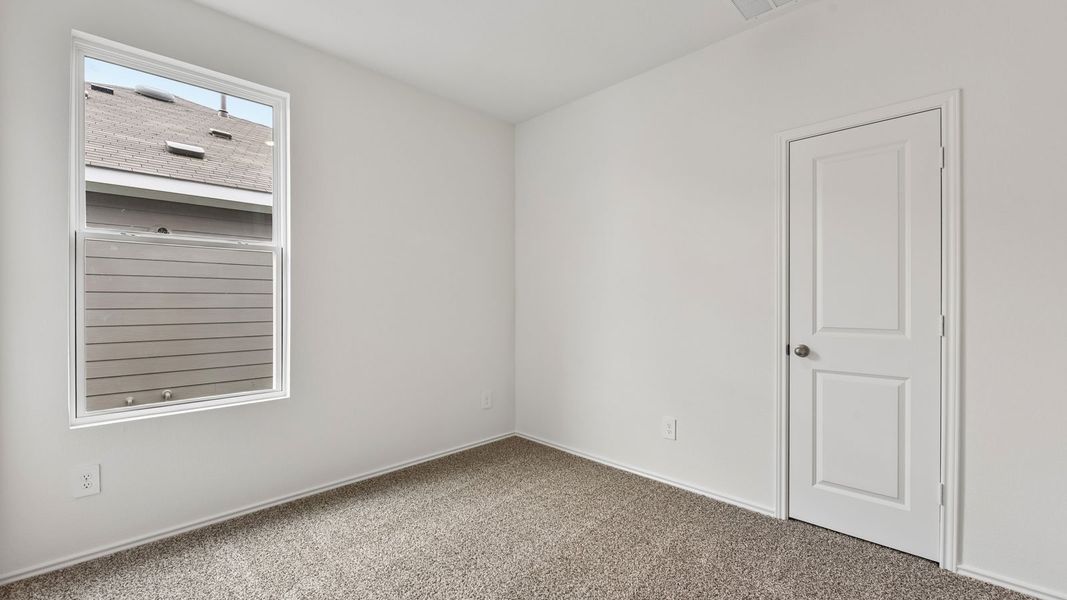 Spacious, unfurnished interior of a new home in Wayside, Uhland (Image 25).