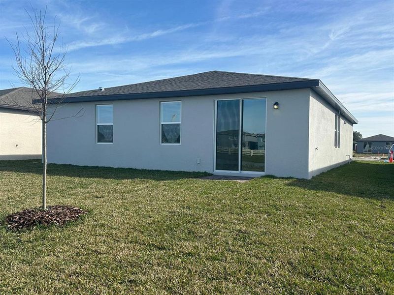 Exterior details and patio area of a home in , Winter Haven (Image 2).