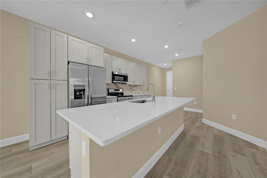 Furnished interior view inside a new home in , Winter Garden (Image 5).