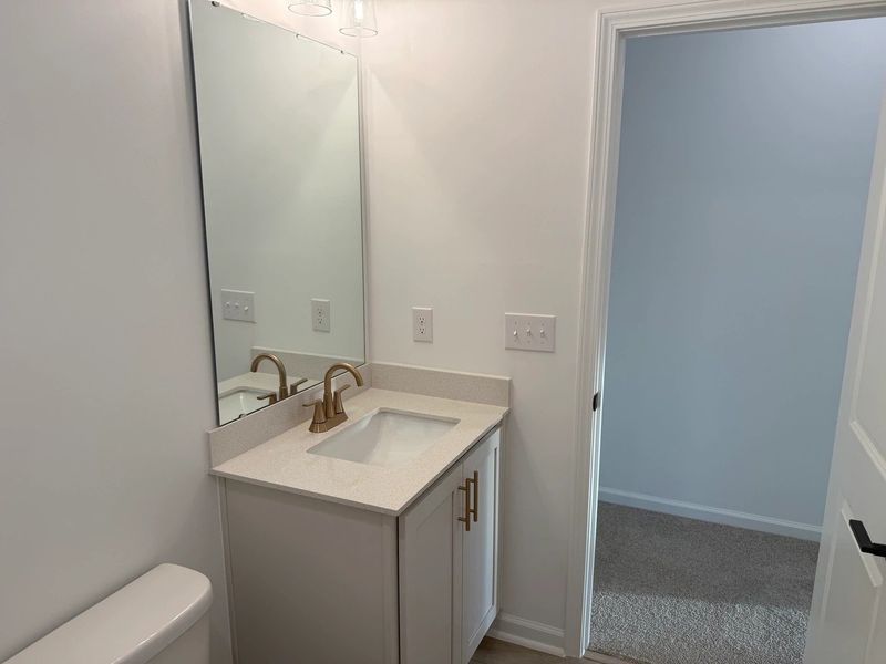 Bath 2 featuring the AW Collection® Serene - Earth-toned surfaces bring warmth and calm.