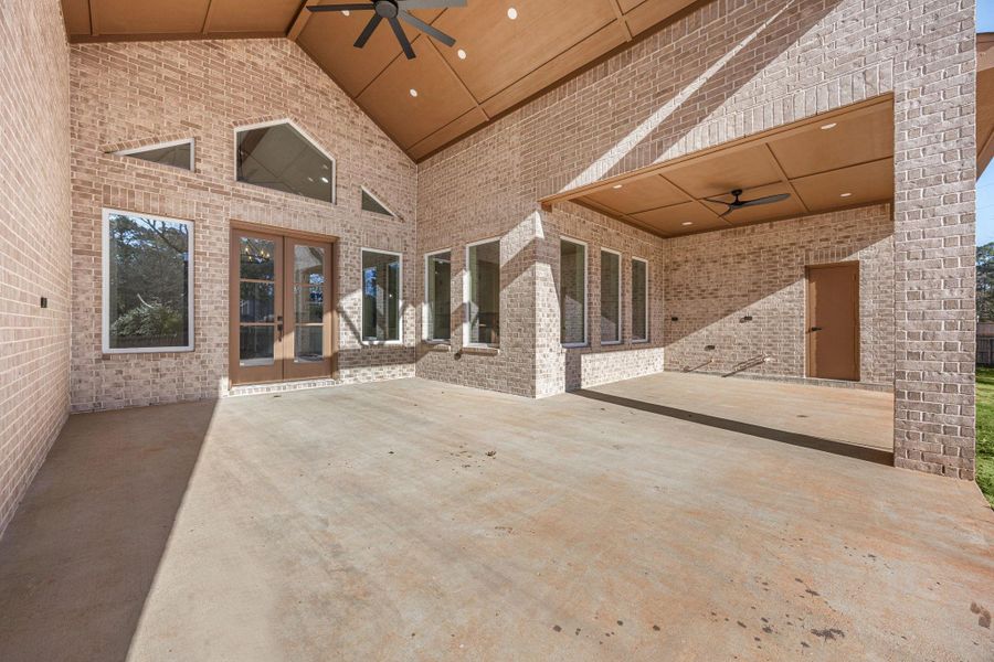 Exterior details and patio area of a home in , Magnolia (Image 3). Exterior details and patio area of a home in , Magnolia (Image 3).