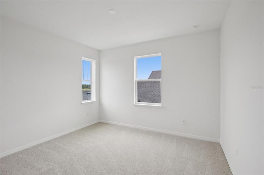 Spacious, unfurnished interior of a new home in Primrose at Longleaf, New Port Richey (Image 38).