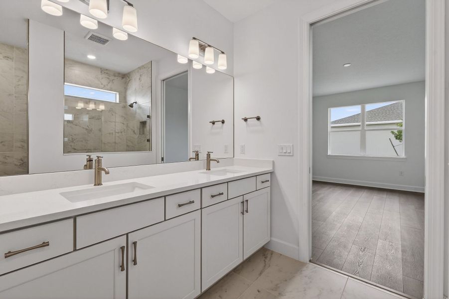 Furnished interior view inside a new home in Del Webb Tradition, Port St. Lucie (Image 56).