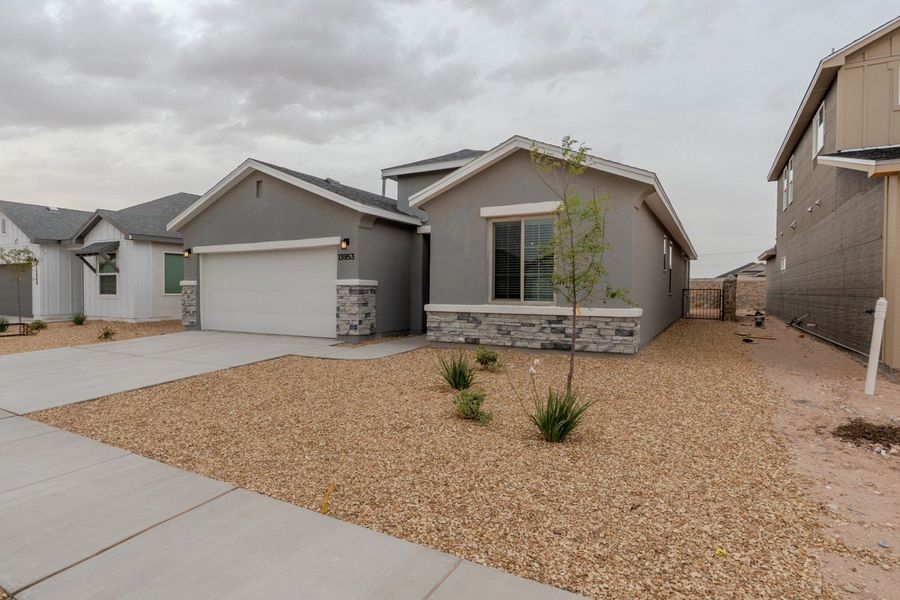 Front exterior of a new home in Summer Sky North, El Paso, TX, highlighting curb appeal (Image 2).