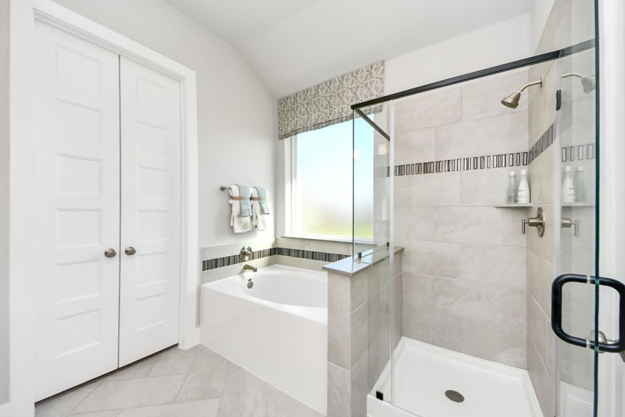 Furnished interior view inside a new home in Sunterra: Premier Collection, Katy (Image 16).