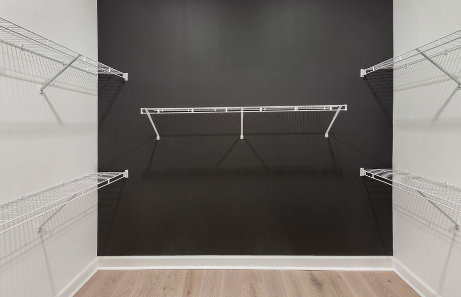 Representative unfurnished interior of a home built from the Mystique by DiVosta in Emerson Oaks, Vero Beach (Image 19).