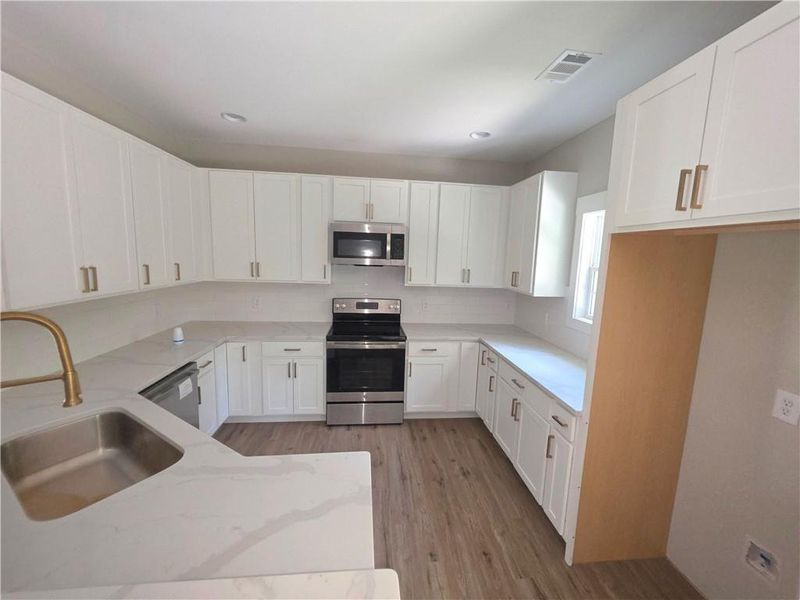 Furnished interior view inside a new home in , Statham (Image 5).