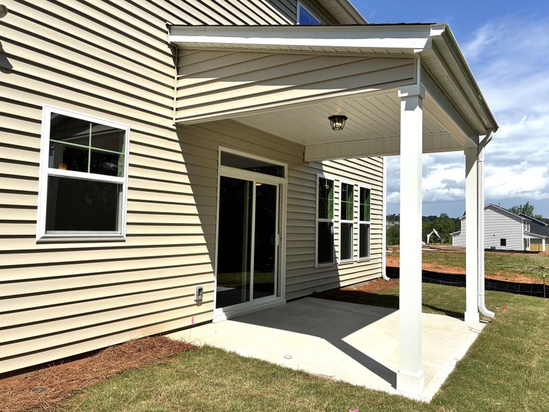 Front exterior of a new home in Holly Ridge, Greenville, SC, highlighting curb appeal (Image 16). Front exterior of a new home in Holly Ridge, Greenville, SC, highlighting curb appeal (Image 16).