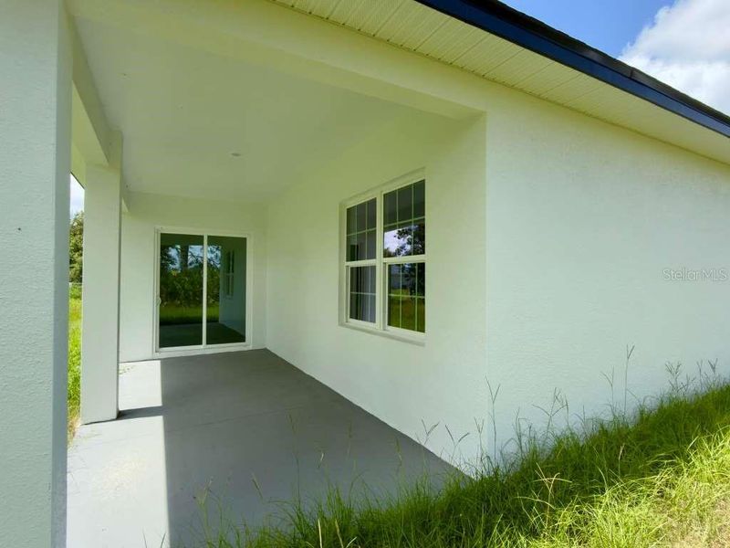 Exterior details and patio area of a home in , Ocala (Image 32).