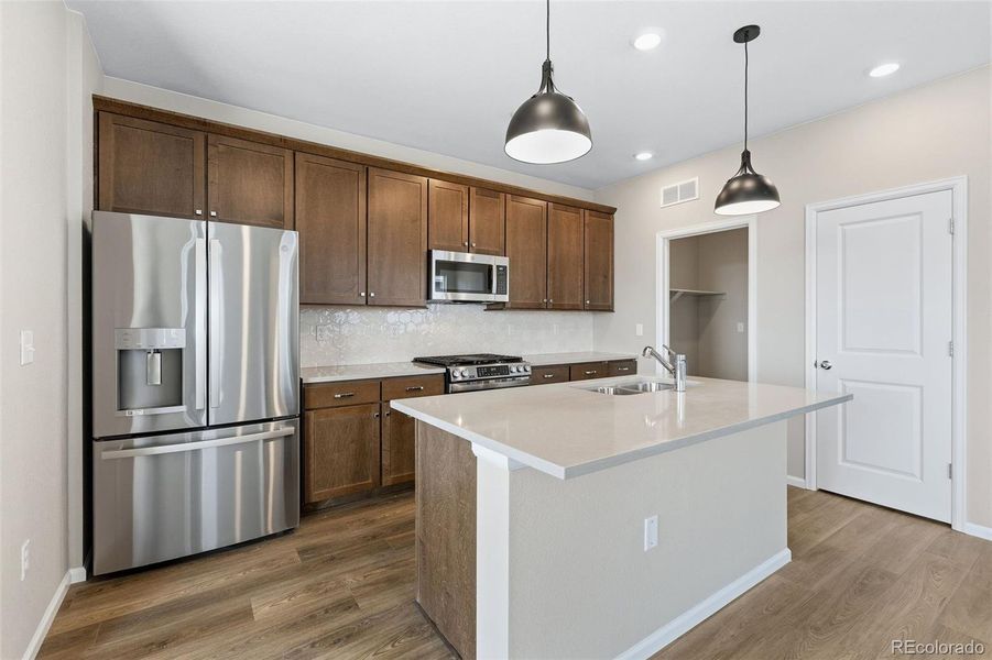 Furnished interior view inside a new home in The Cottages Collection at Ridgeline Vista, Brighton (Image 3).
