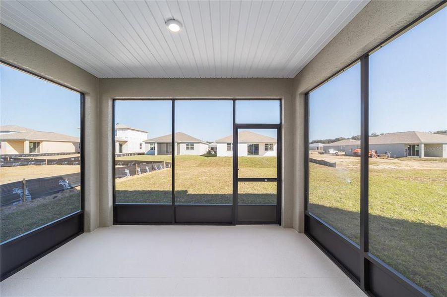 Exterior details and patio area of a home in Calesa Township, Ocala (Image 3).