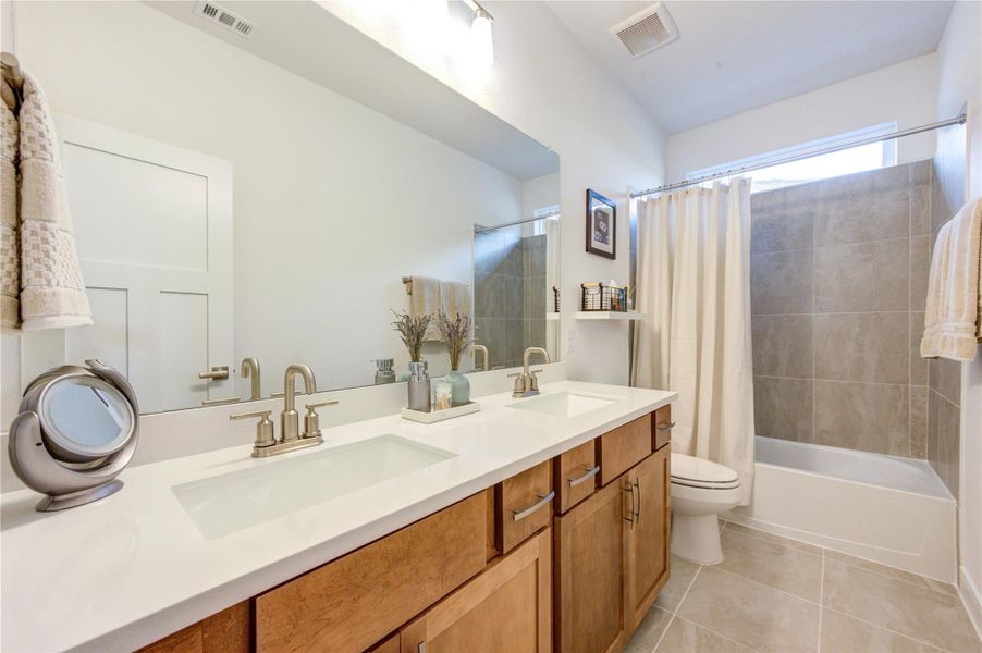 Furnished interior view inside a new home in Easthaven at Bridgeland Central, Cypress (Image 16).