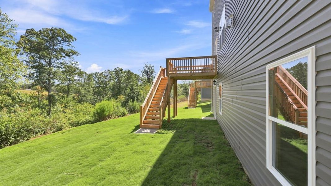 Exterior details and patio area of a home in Spring Ridge, Anderson (Image 28).